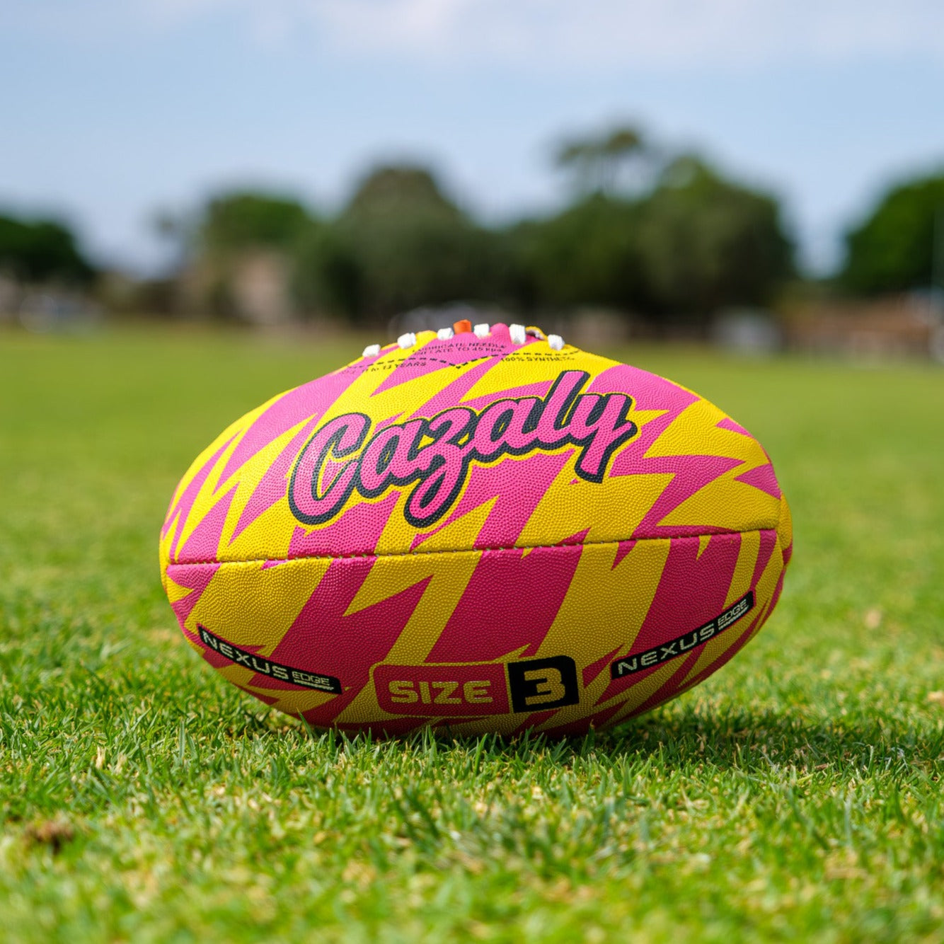 The Nexus Edge Cazaly ball on a grassy AFL oval