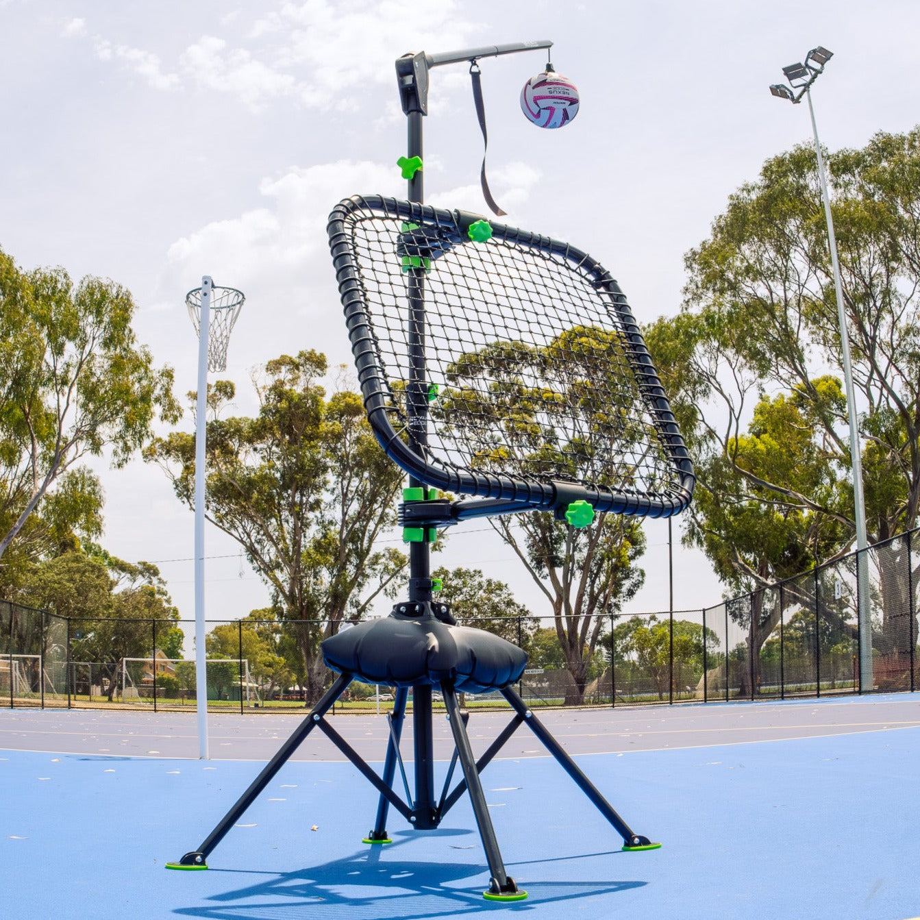 The Nexus Edge stands on a court configured to practise netball skills